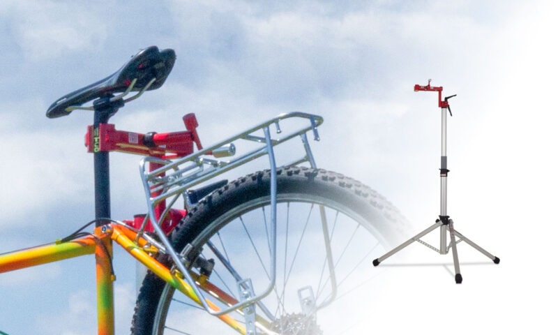 Field Unit mobile workstand by Minoura and EVT, featuring a durable steel clamp, ergonomic handle, and stable base.